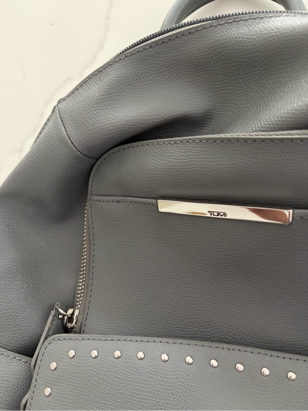 Tumi Women’s Gray Leather Studded Backpack. Large size.
NWOT. Never used it. - Picture 6 of 16